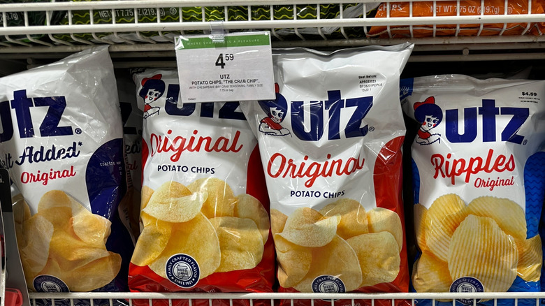 Bags of Utz Wavy Original Potato Chips on a store shelf