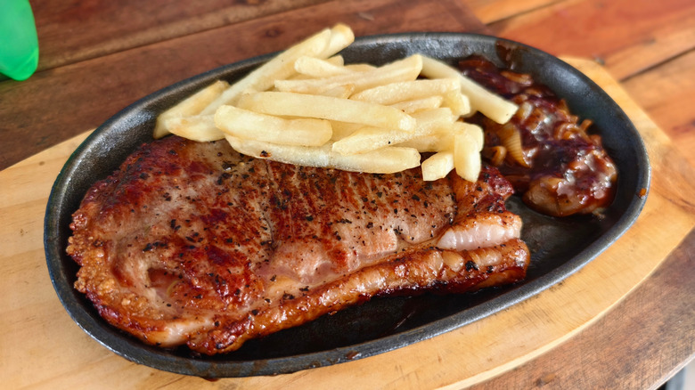 Plate with steak and fries