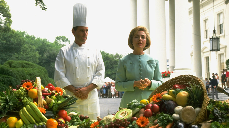 Hillary Clinton and an executive chef interviewed in front of White House
