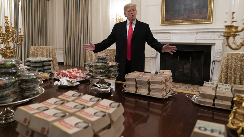 President Trump presides over a table of fast food