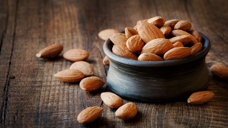 almonds in a black bowl