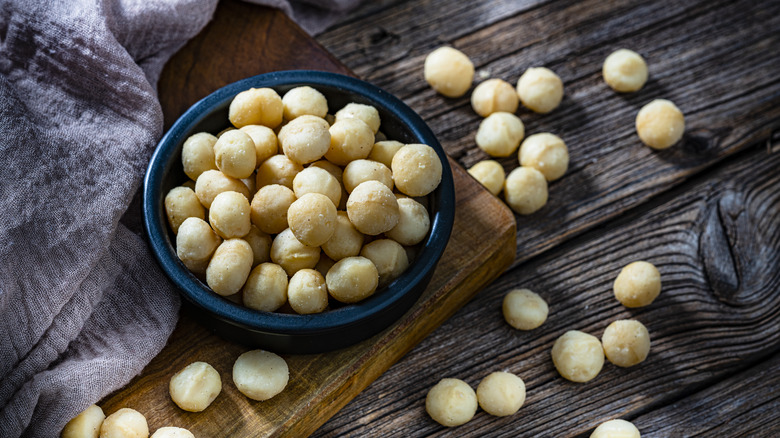 macadamia nuts in blue bowl