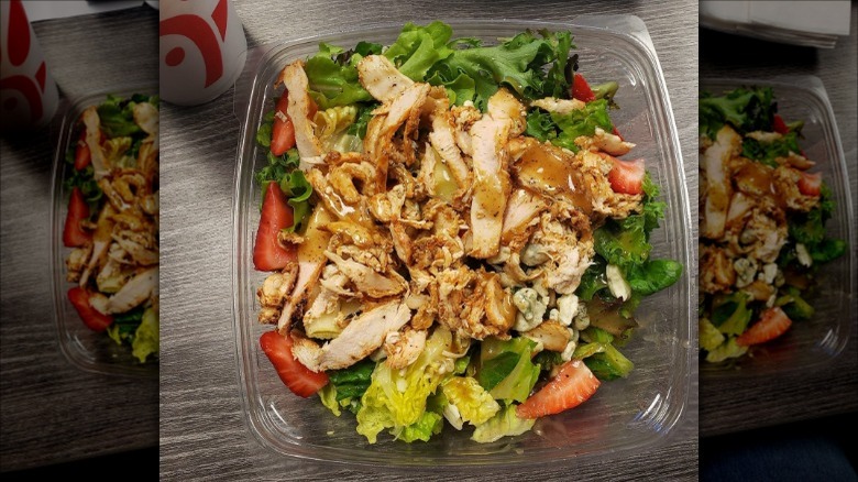 Strawberry chicken salad on table