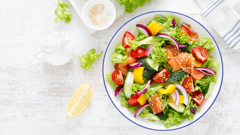 Salmon salad on table