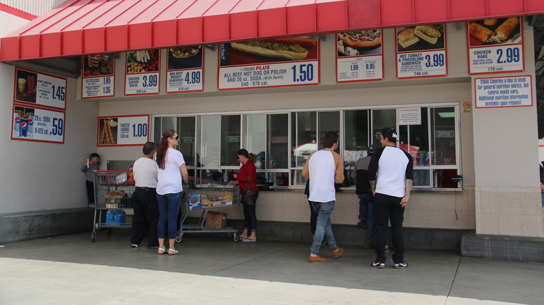 Customers ordering at a Costco food court
