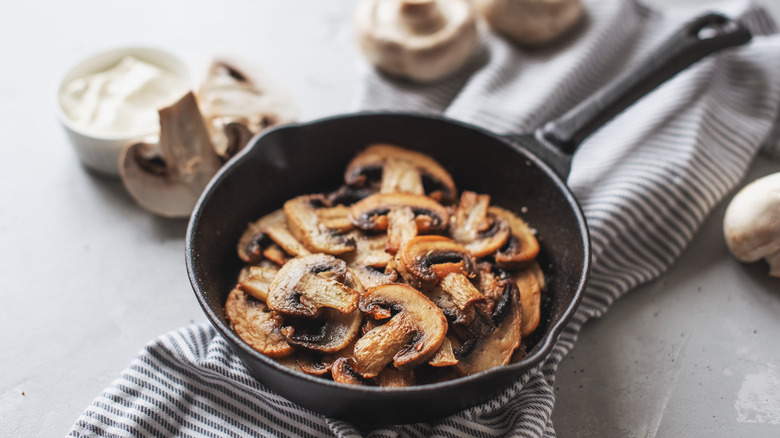 A pan of fried mushrooms.