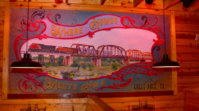 Texas Roadhouse mural displaying bridge in Eagle Pass, TX
