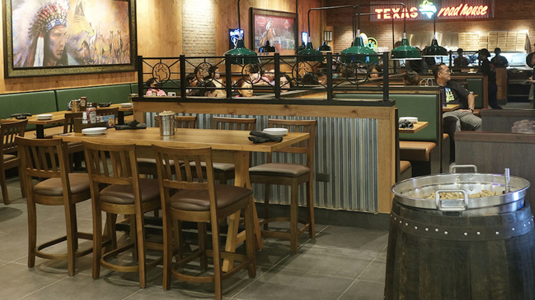 Texas Roadhouse interior with wood and corrugated metal