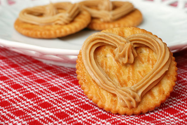 Crackers Dipped in Nut Butters