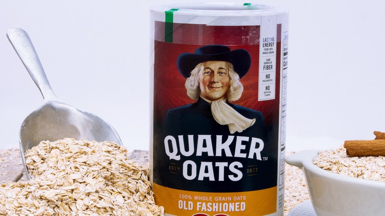 Package of Quaker Oats with oats surrounding it