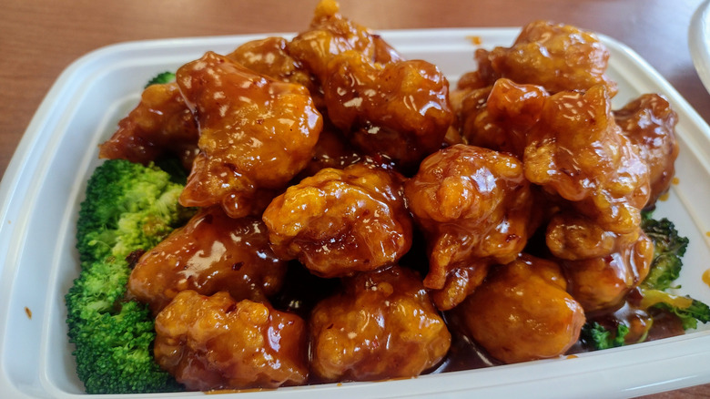 Chinese takeout orange chicken and broccoli