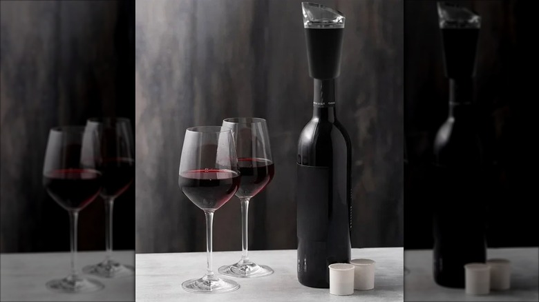 PureWine Wine Purifier Kit with a bottle of red wine and two wine glasses