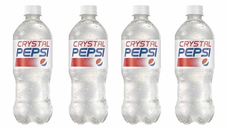 bottles of crystal pepsi against white background