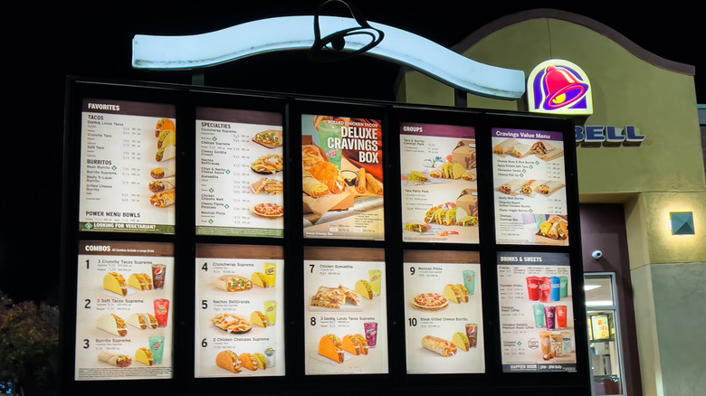 Taco Bell drive thru menu at night
