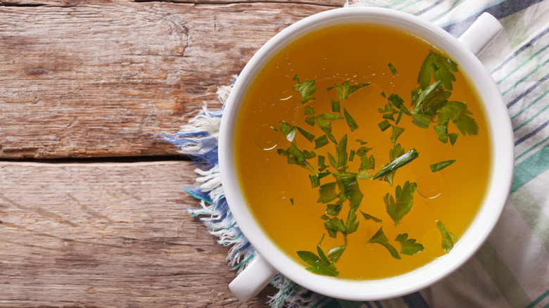 meat broth with parsley