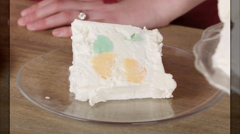 A slice of rainbow snowball cake