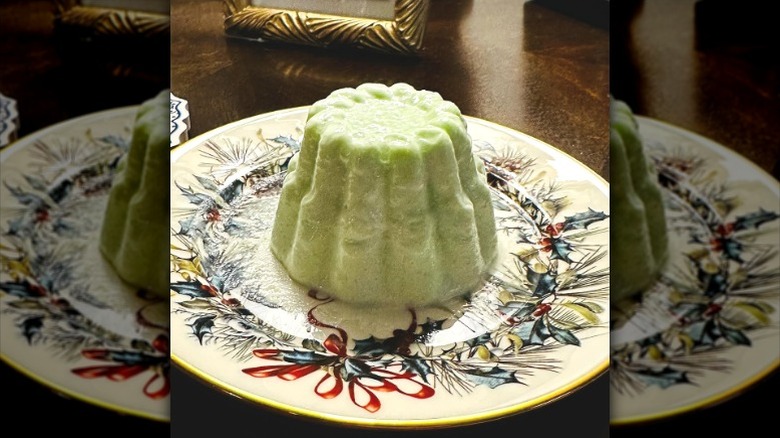A molded vintage seafoam salad on a plate