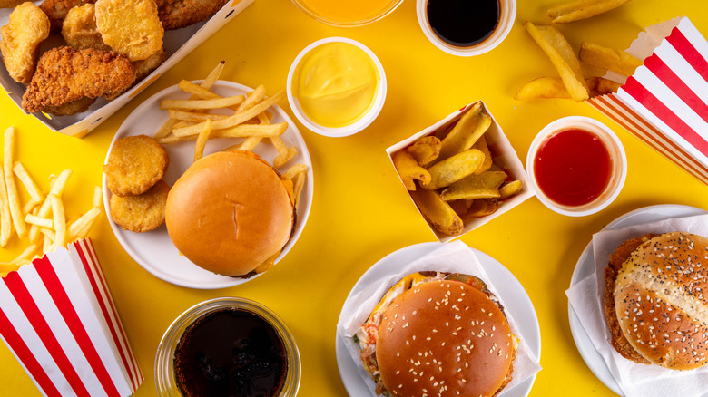 Overhead view of fast food items, including burgers, fries, and chicken nuggets