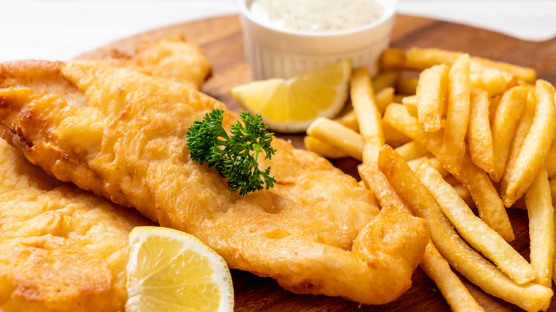 Fish and chips with garnish 