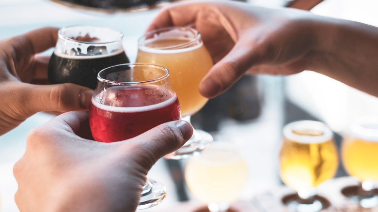 Three sour beers being enjoyed