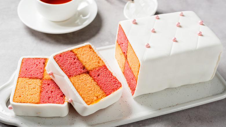 Battenberg cake on white tray