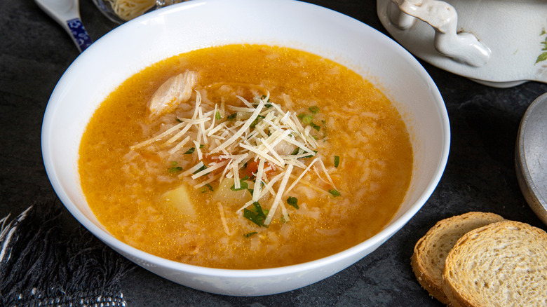 Cheese on rice soup with bread