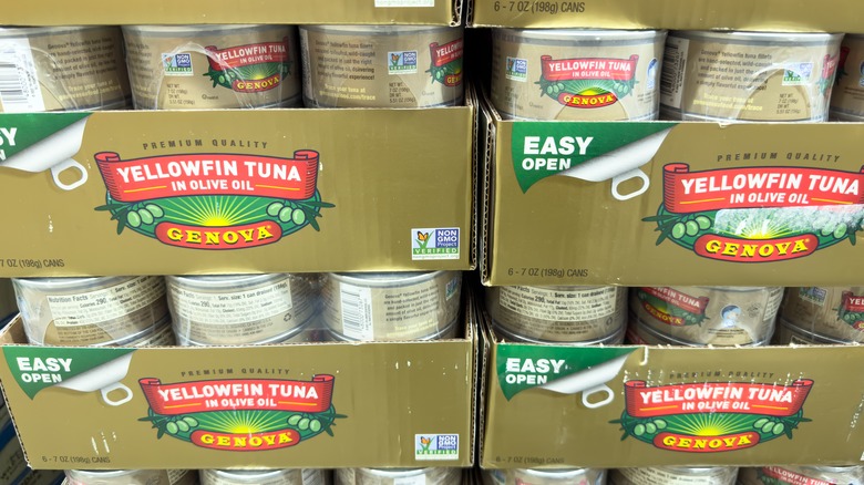 Genova yellowfin tuna can stacked at a store