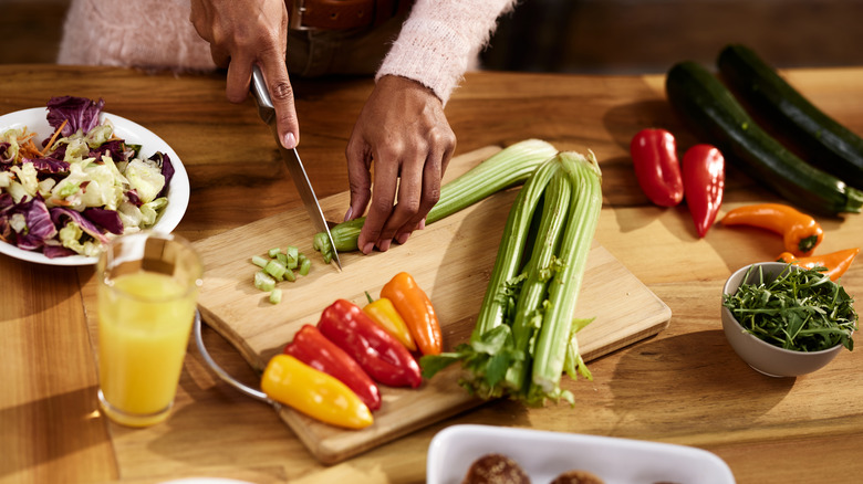 Woman cutting produce
