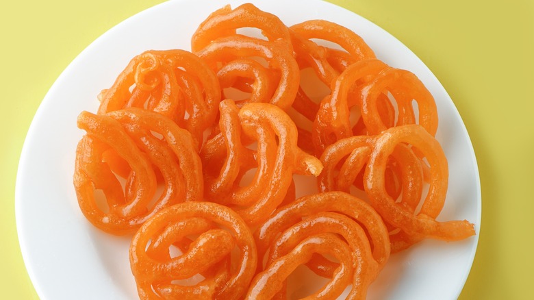 Plate of bright orange jalebis