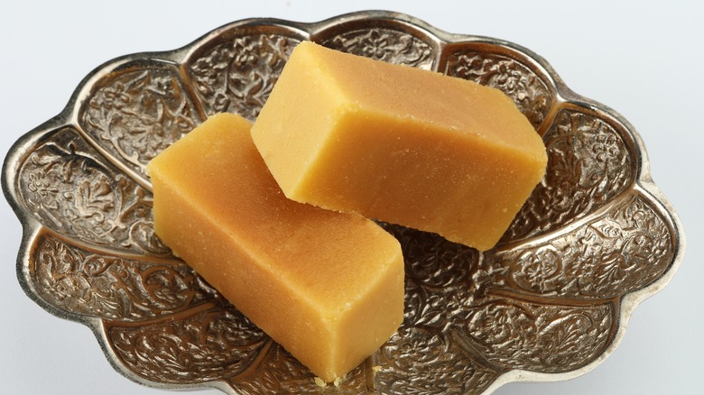 Mysore pak in a metal bowl