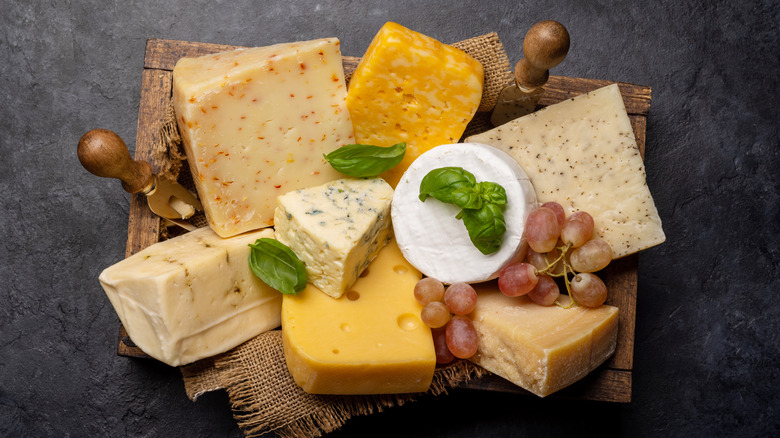 various cheeses in box