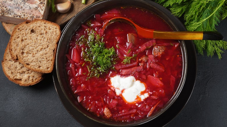 Borscht with sour cream and bread