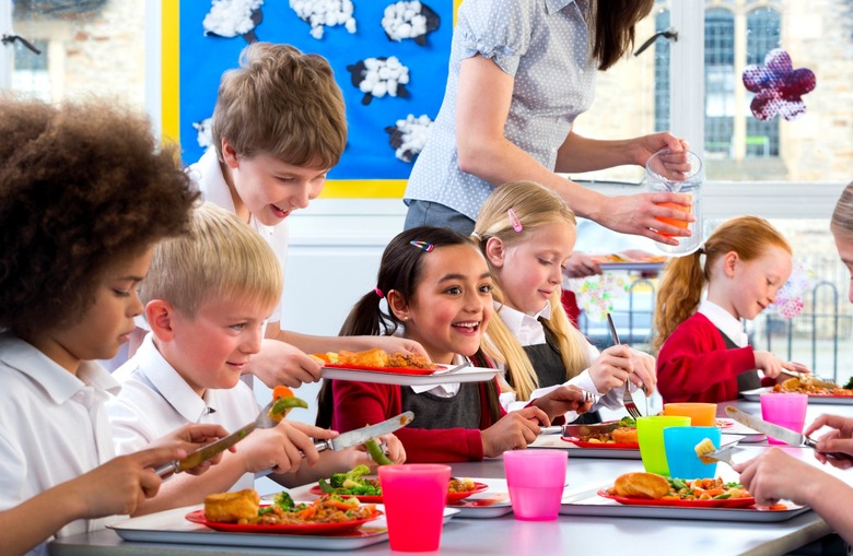 Schoolkids enjoying lunch in the cafeteria