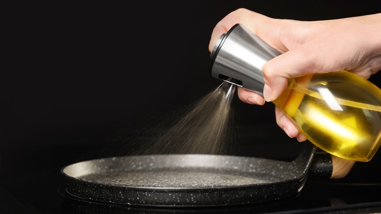 Cooking oil sprayed on pan