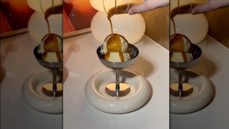Pouring soy sauce over ice cream