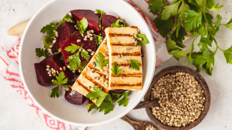 grilled tofu on a beet salad