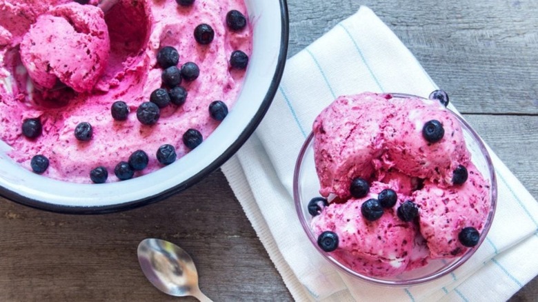 bowls of akutaq with blueberries