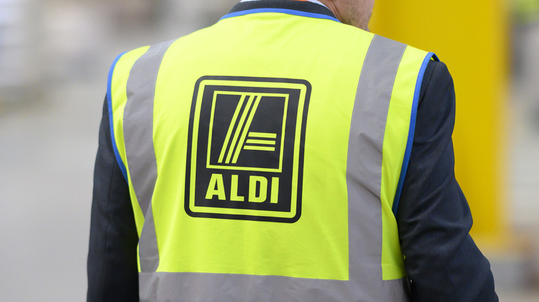 Aldi employee in an Aldi vest