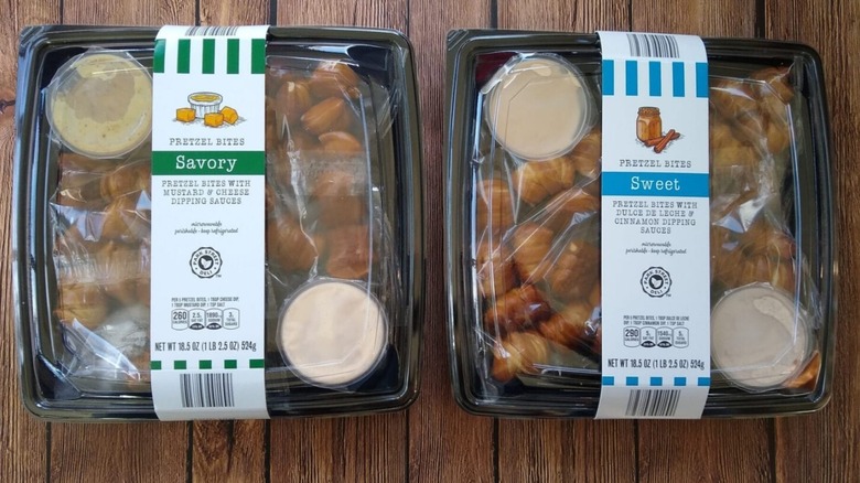 Two pretzel trays on a wooden background