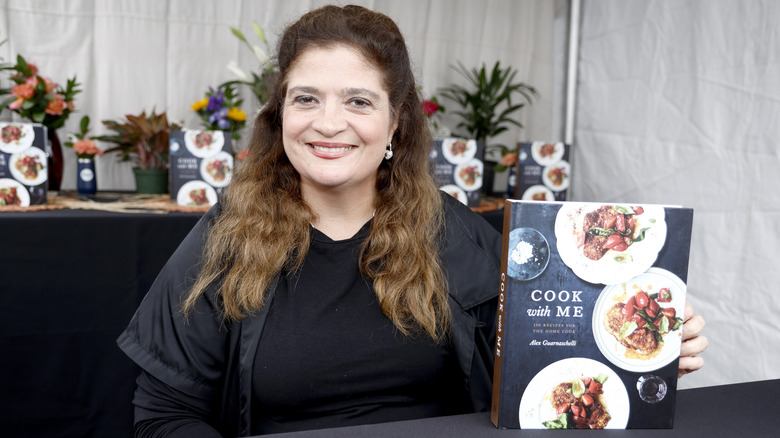 Alex Guarnaschelli with cookbook