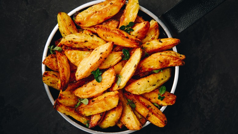 Bowl of crispy potato wedges