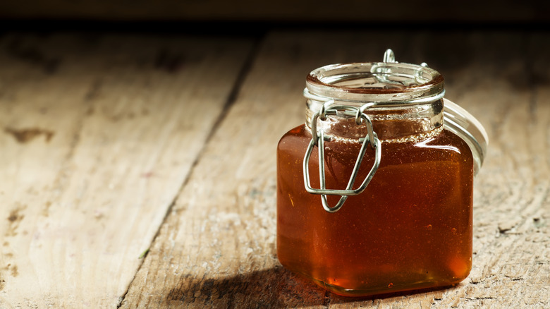 Resealable jar of honey
