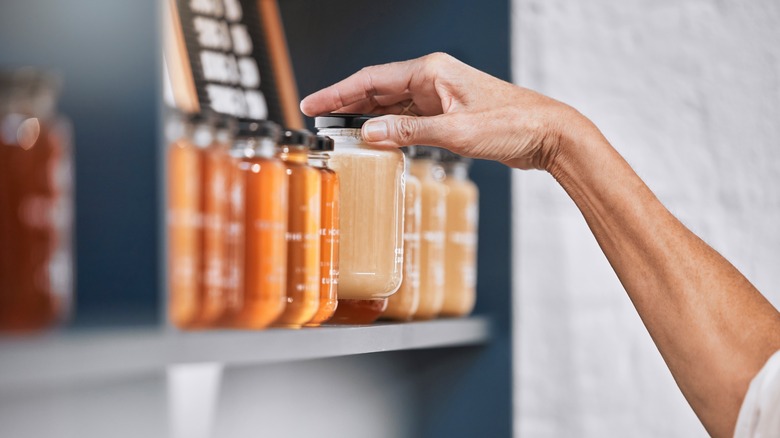 Choosing a jar of honey