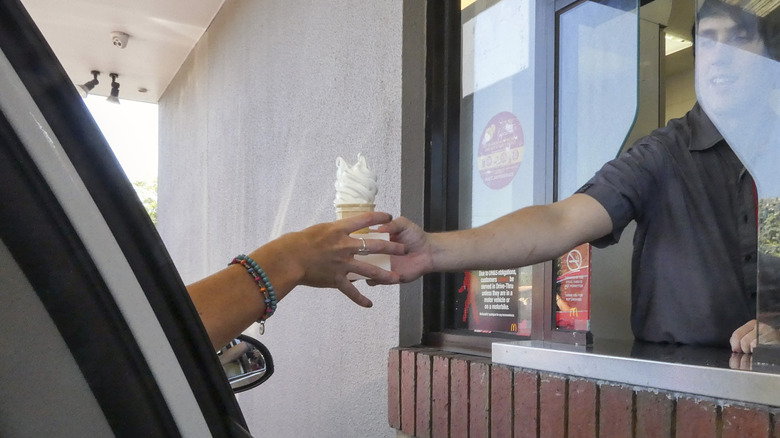 Person recieving drive-through ice cream