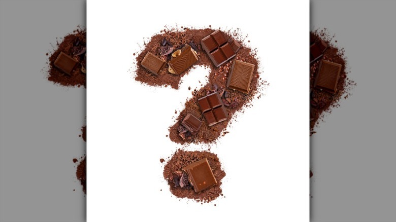 A question mark made out of chocolates on a white background