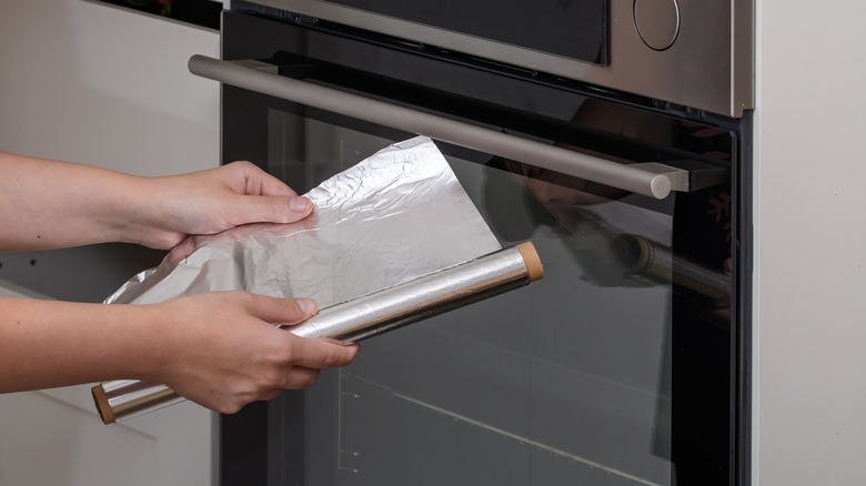 aluminum foil next to oven