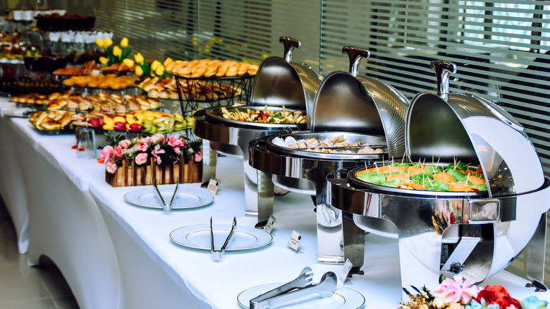 A long, colorful buffet spread.