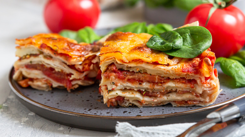 two pieces of lasagna on a plate