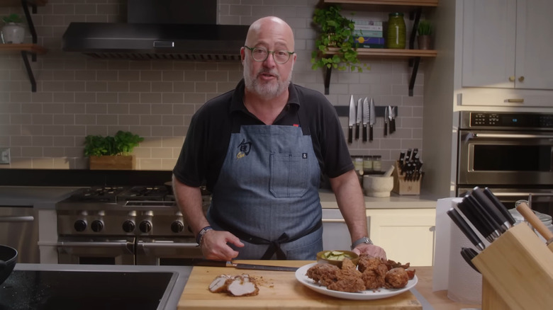 Andrew Zimmern with fried chicken