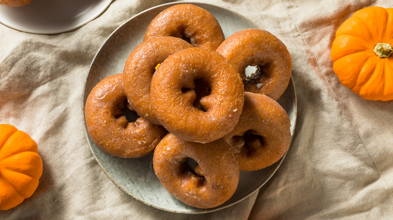 pumpkin spice donuts on a plate